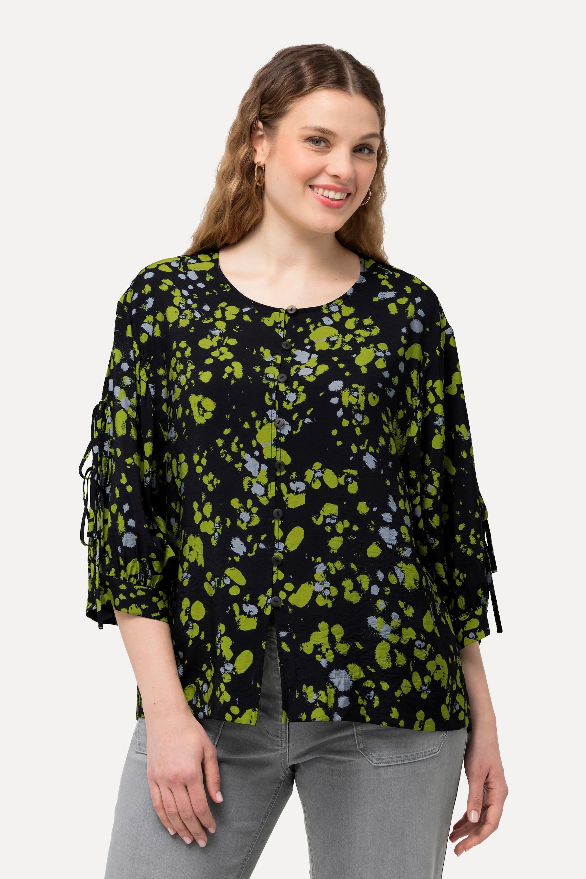 Ulla Popken  Blouse imprimé à pois. Col rond et manches longues. Silhouette en A. 