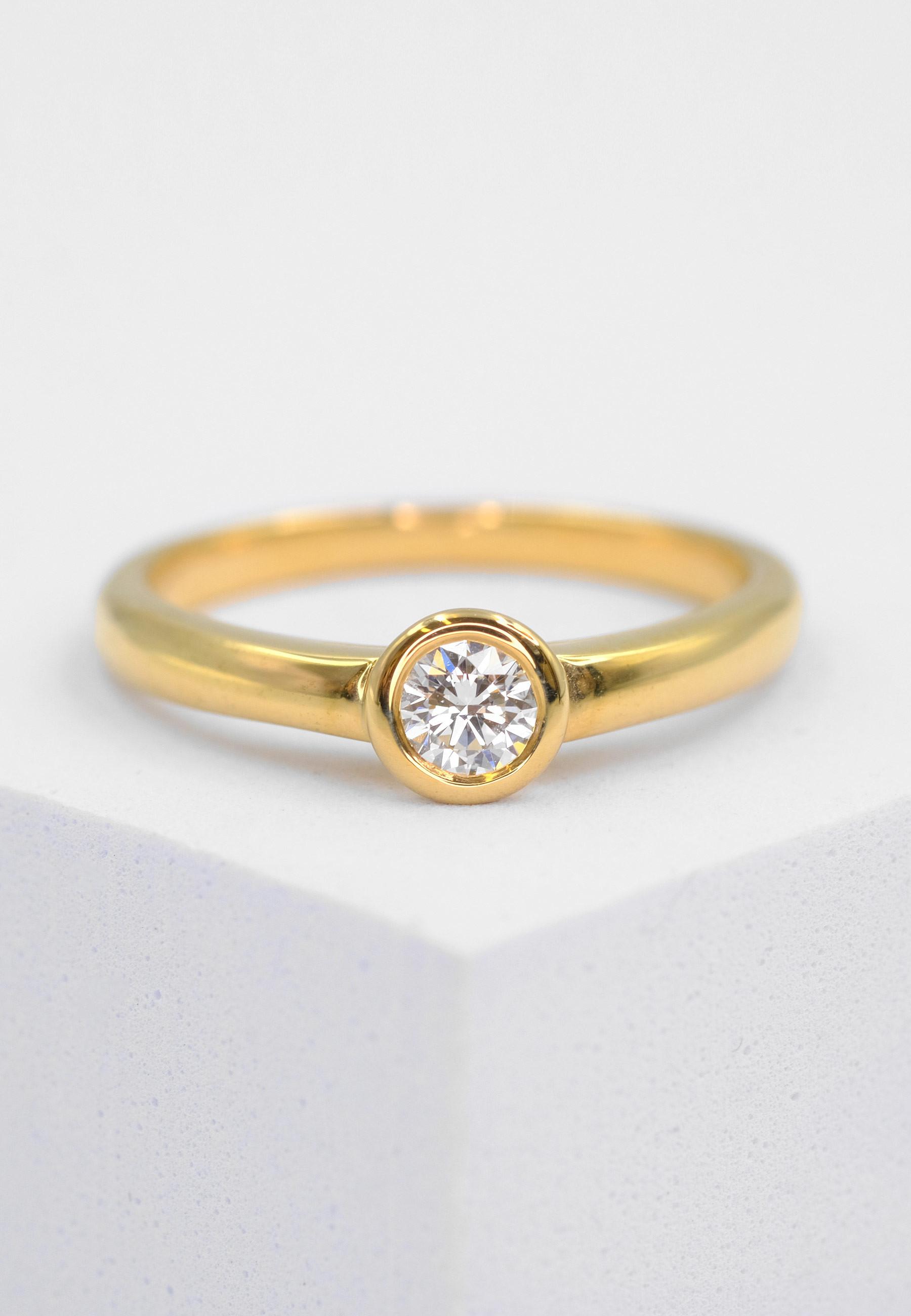 MUAU Schmuck  Solitaire Ring Diamant 0.20ct. Gelbgold 750 