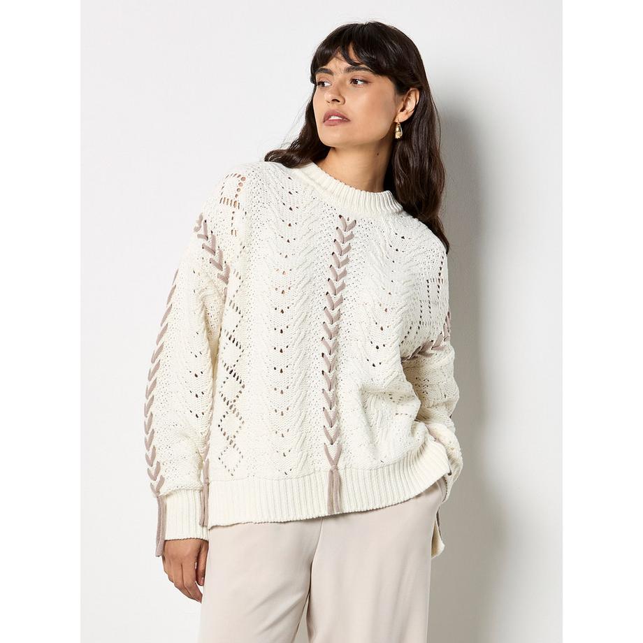 Pull en maille pointelle à lacets