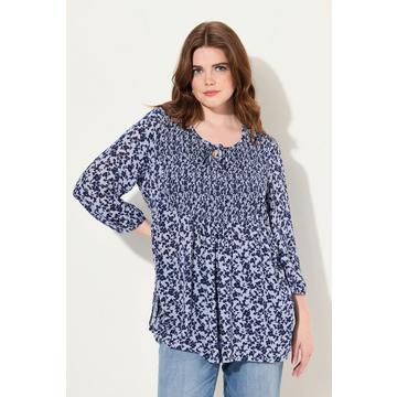 Blusa a punto smock con design floreale, taglio svasato, scollo a girocollo e maniche a 3/4