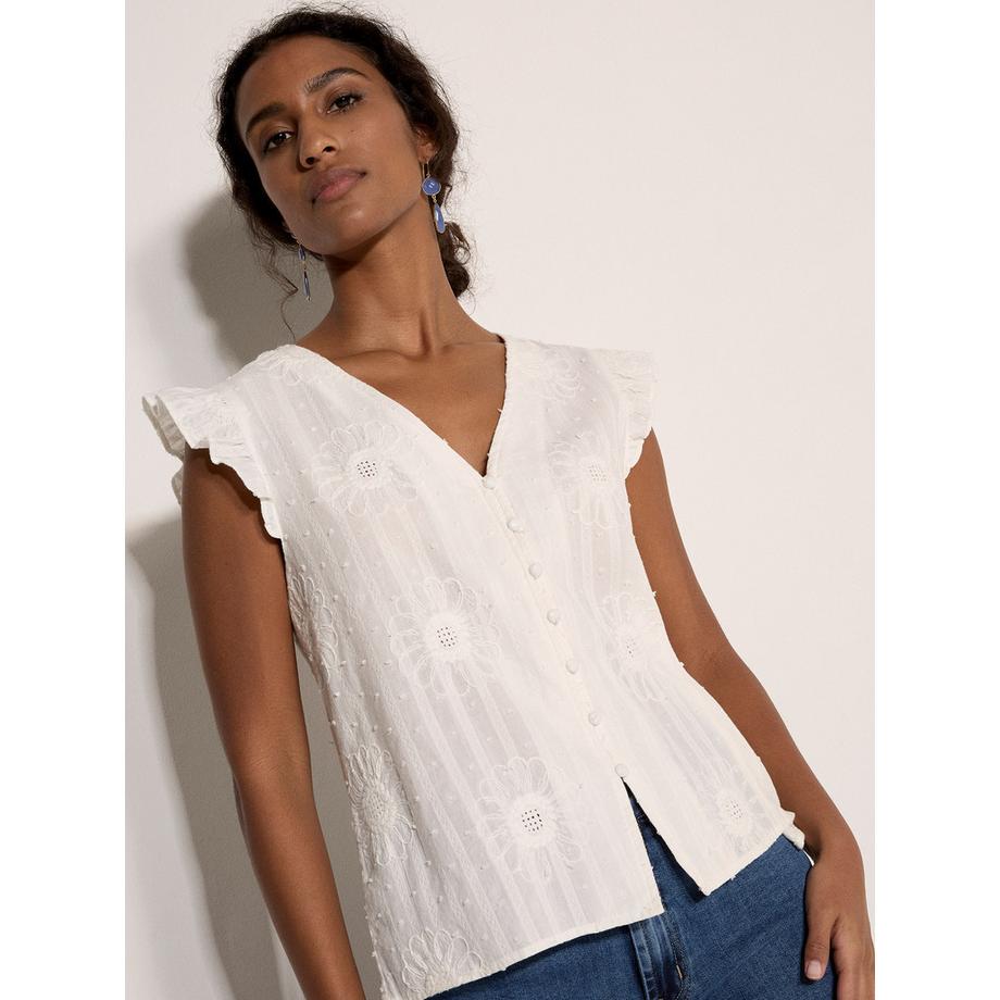 Blouse brodée de marguerites