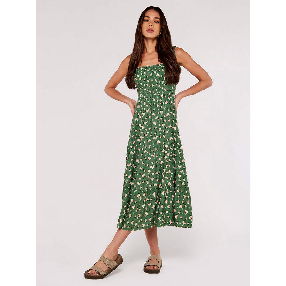 Robe mi-longue smockée à petits motifs floraux
