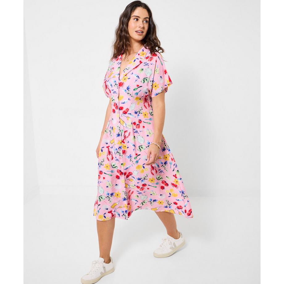 Robe d'après-midi à manches chauve-souris et imprimé amusant