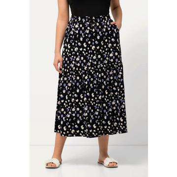 Jupe maxi en jersey à pois. Coupe trapèze et taille élastique