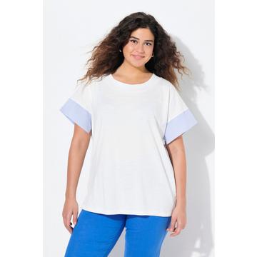 T-shirt à rayures oversize. Décolleté rond et manches courtes