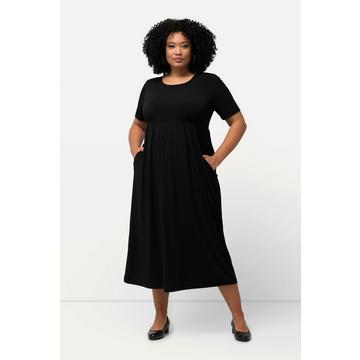 Robe en jersey à décolleté rond et manches courtes, avec couture empire et poches