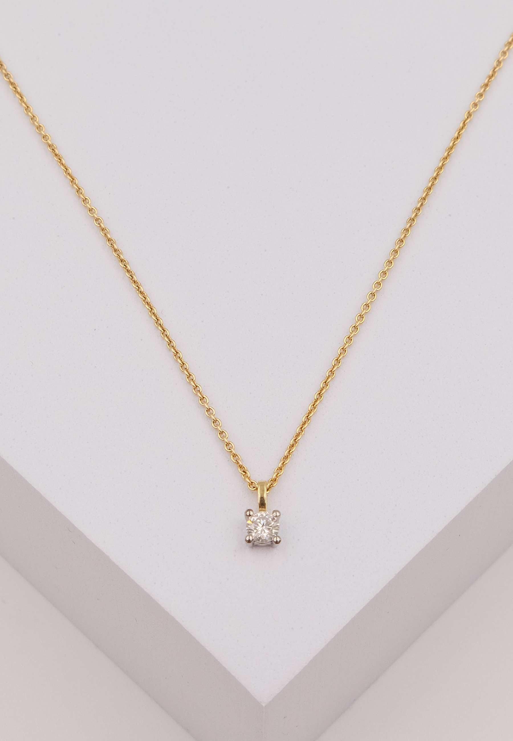 MUAU Schmuck  Solitär Anhänger 4-Griff-Fassung Gelbgold 750 Diamant 0.25ct. Fassung Weissgold 750, 9x5mm 