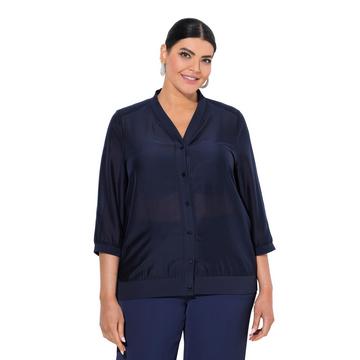 Blusotto leggermente velato con scollo a V e maniche a 3/4