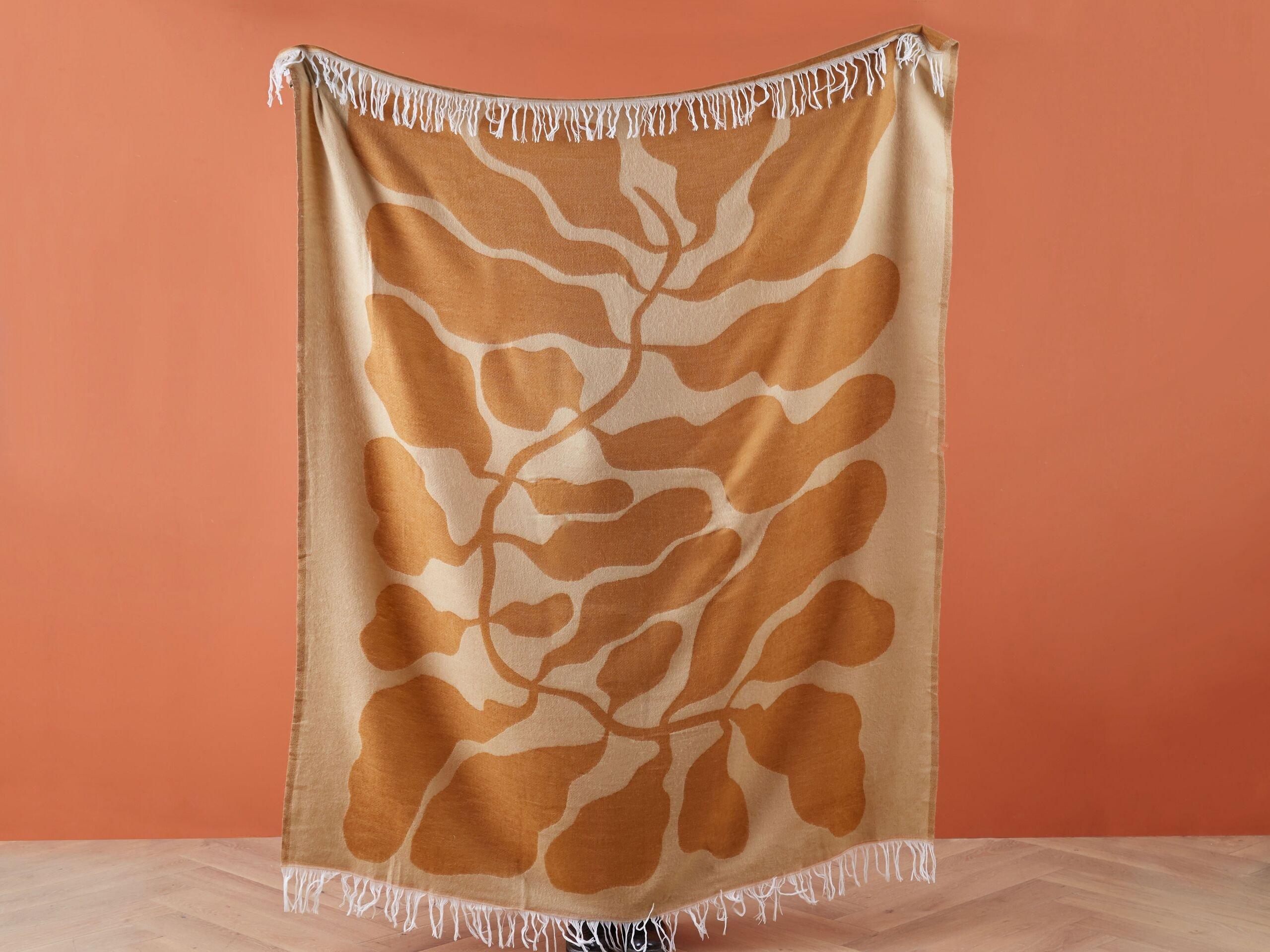 Beliani Kuscheldecke aus Polyester Boho BANGRE  