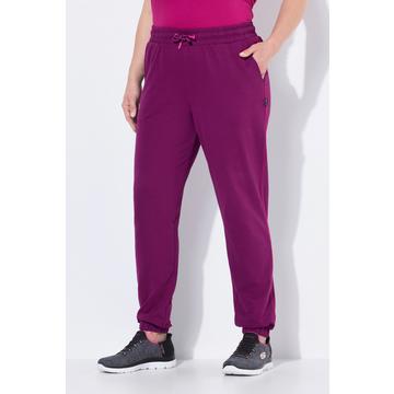 Pantaloni sportivi con orli elastici e pistagna laterale