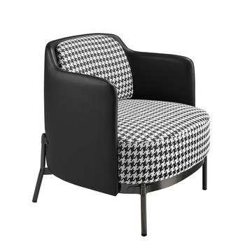 Fauteuil en tissu noir et blanc et similicuir noir