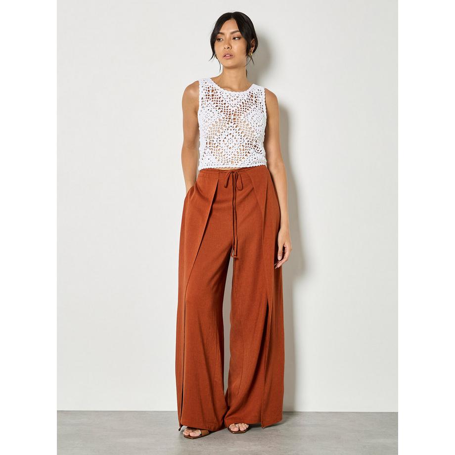 Pantalon large croisé en lin mélangé