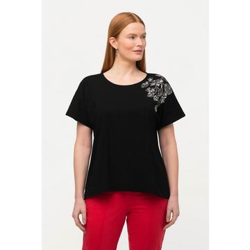 T-shirt oversized, avec jolie broderie en perles. Décolleté rond, manches courtes.