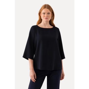 Blouse en triacétate. Décolleté rond et manches 3/4. Coupe Boxy Fit.