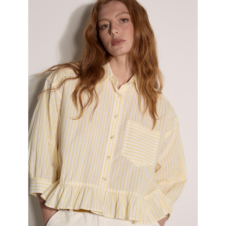 Chemise à rayures et ourlet à volants