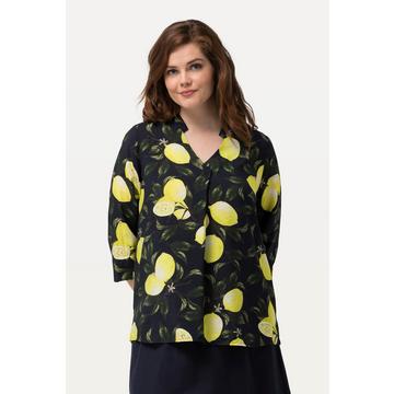 Blouse imprimé citrons, col légèrement montant. Décolleté en V et manches 3/4.