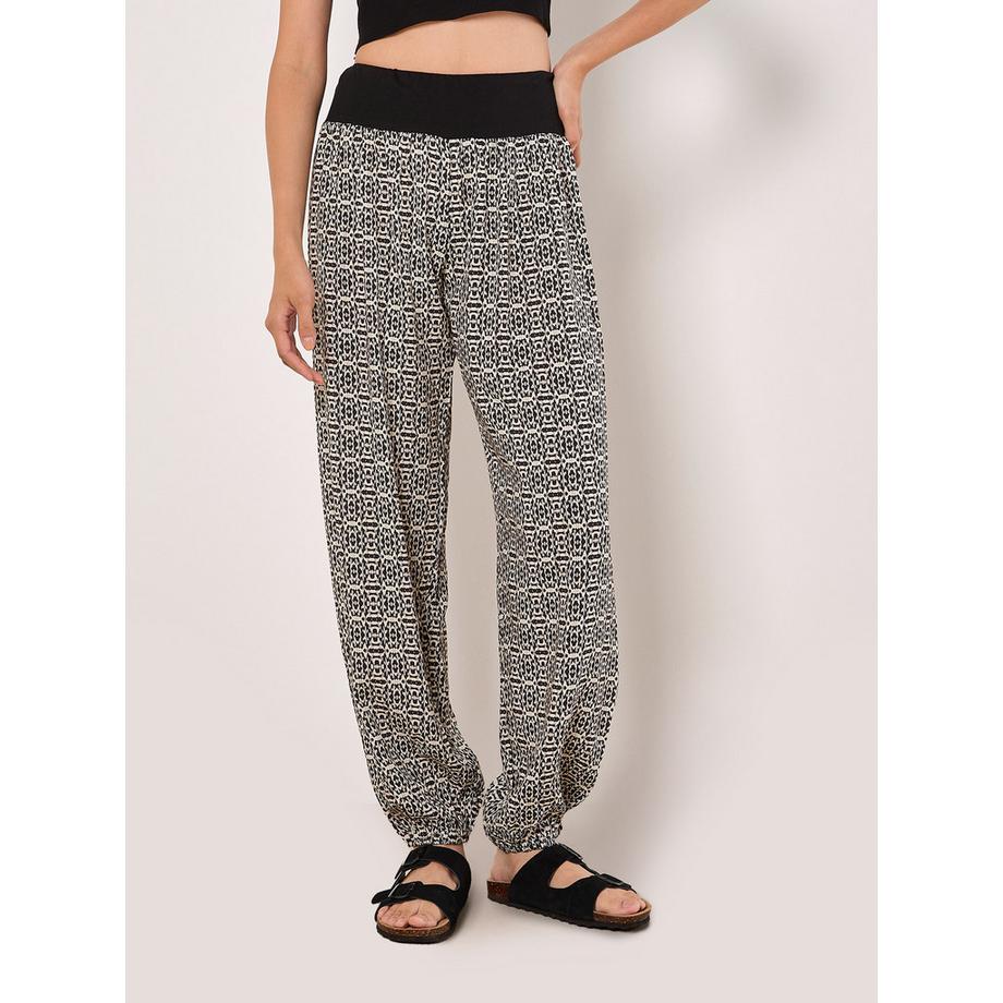 APRICOT  Pantalon de jogging fuselé en coton mélangé à motifs ikat 