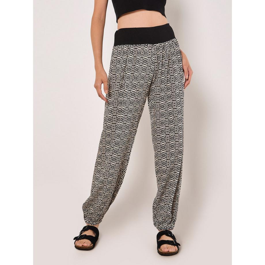 APRICOT  Pantalon de jogging fuselé en coton mélangé à motifs ikat 
