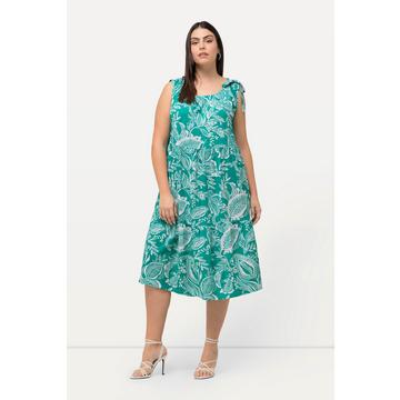 Robe sans manches. Décolleté rond, imprimé feuilles et nœud fantaisie.