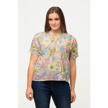 Blouse oversized. Décolleté en V et manches courtes. Imprimé floral.