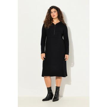 Robe midi en jersey bord-côte. Décolleté en V, fermeture à glissière et manches longues. Coupe évasée.