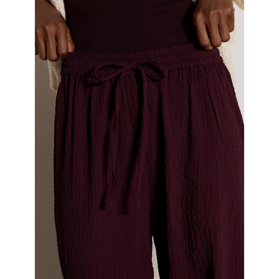 APRICOT Pantaloni da jogging a gamba larga con struttura crinkle  