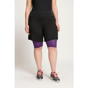 Short 2-en-1, legging intérieur, poche zippée