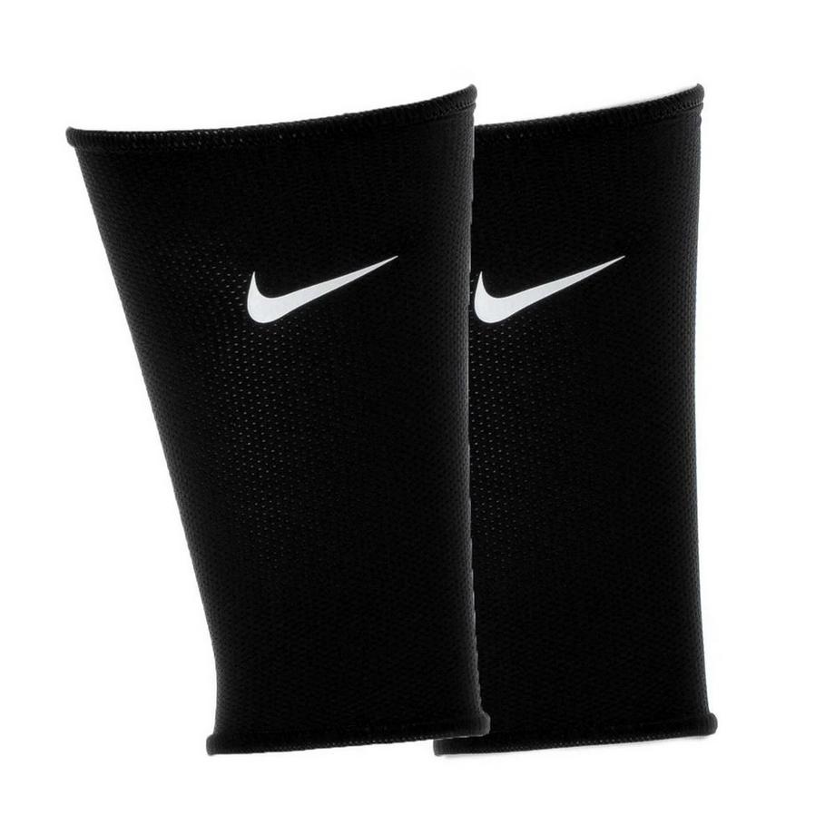 NIKE Manchons Protègetibias avec Logo  