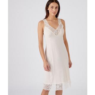 Damart  Fond de robe, dentelle extensible au décolleté et à la base. 