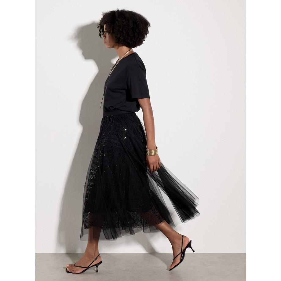 Jupe mi-longue en tulle à paillettes