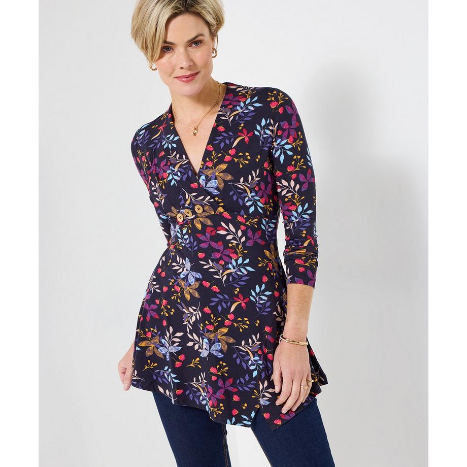 Figurbetonte Tunika mit Blumenmuster, asymmetrischem Saum und langen Ärmeln