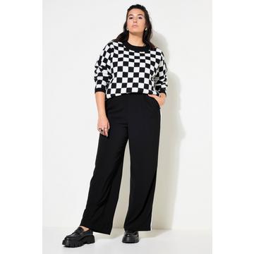 Pantalon de tailleur. Taille haute. Passepoil sur les côtés