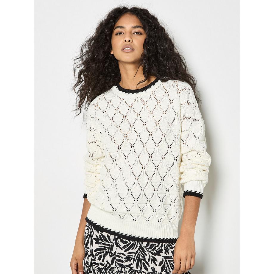 Pull en maille pointelle avec couture festonnée