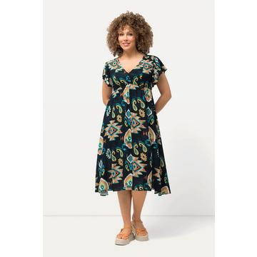 Robe midi avec manches courtes chauve-souris. Décolleté en V, esprit cache-cœur.