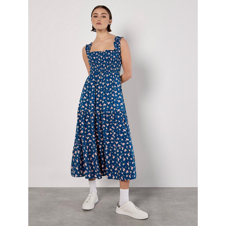 Robe mi-longue smockée à petits motifs floraux