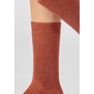 Damart  Chaussettes maille jersey. 