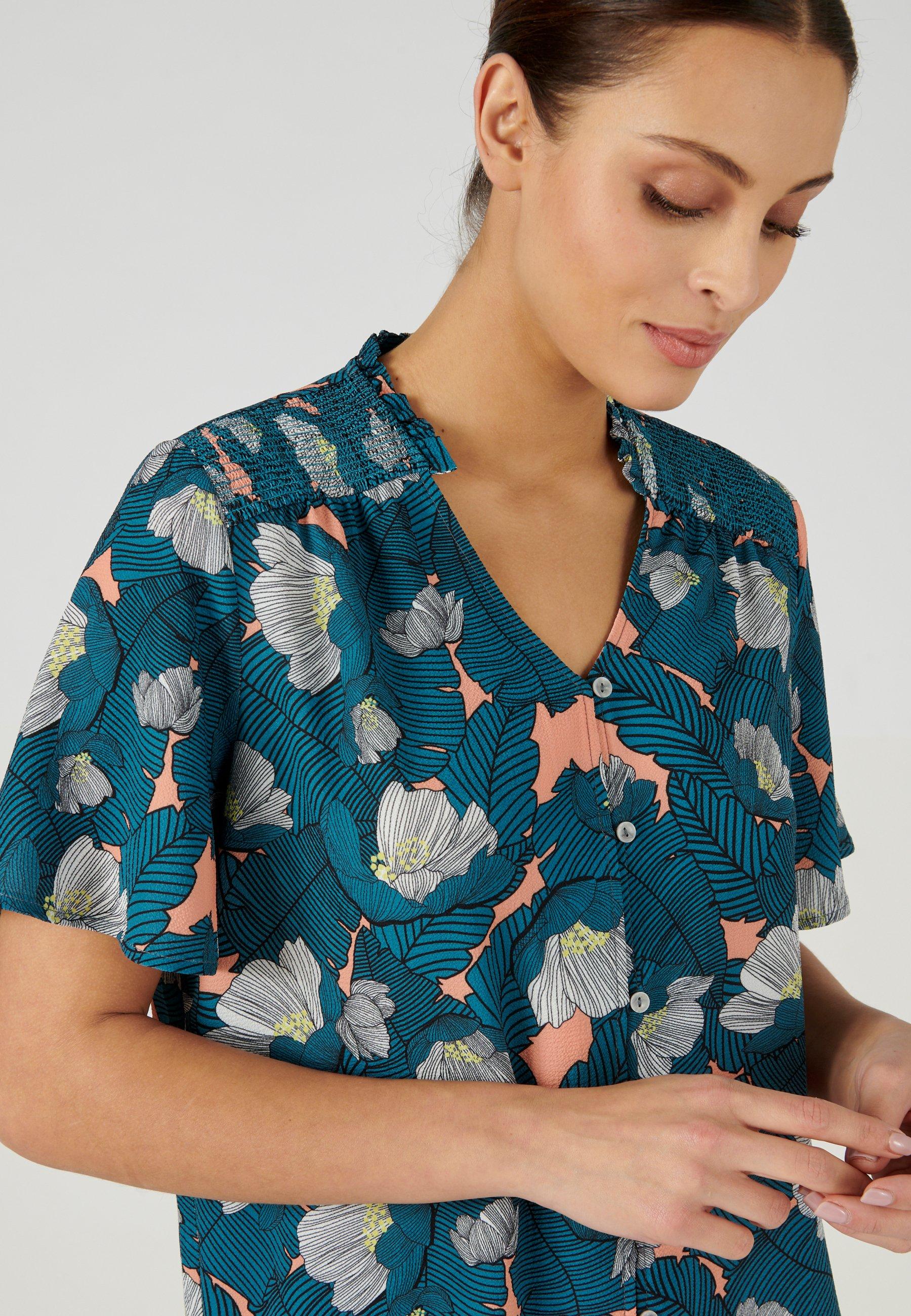 Damart  Bluse aus strukturiertem Crêpe-Stretch. 