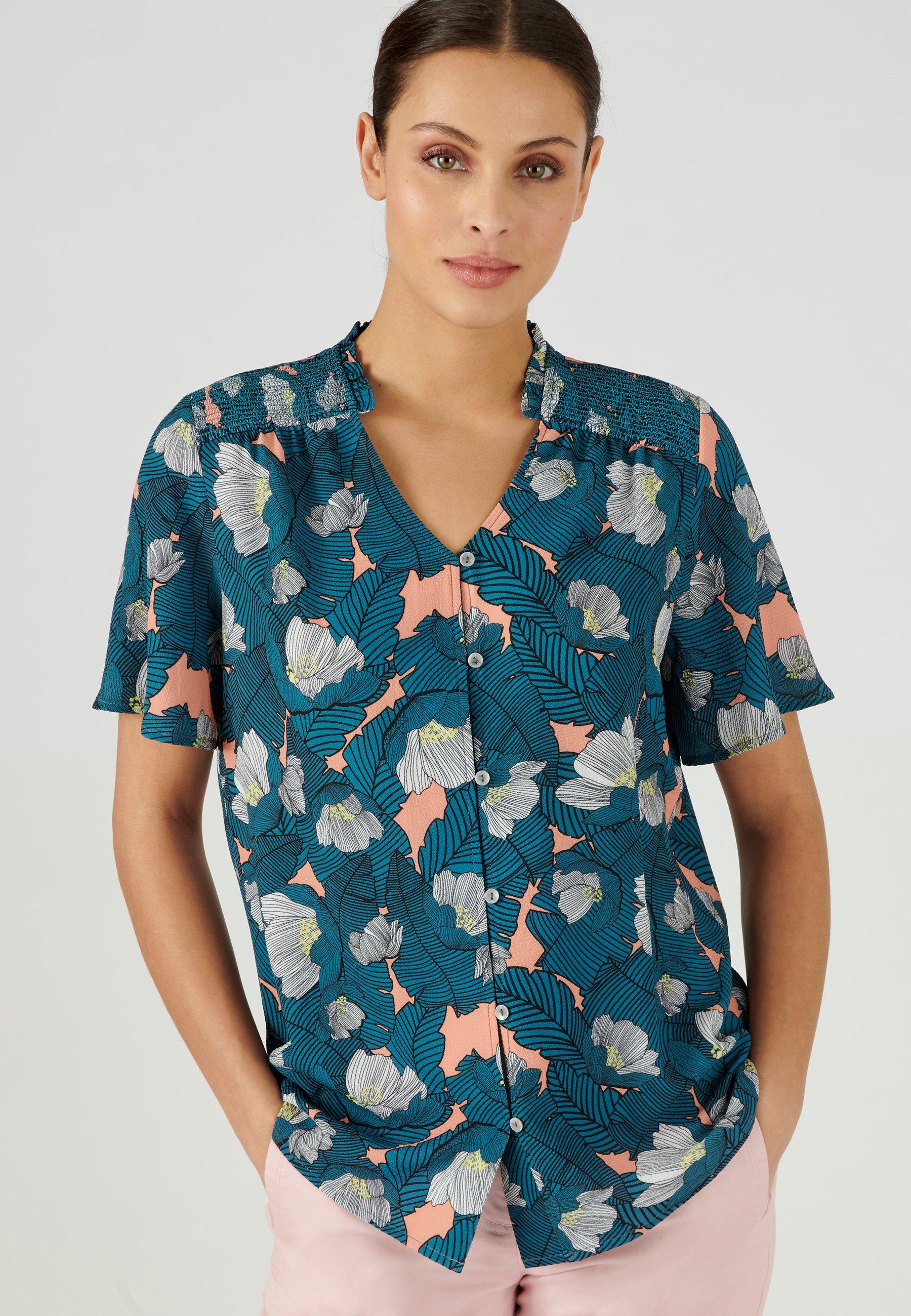 Damart  Bluse aus strukturiertem Crêpe-Stretch. 