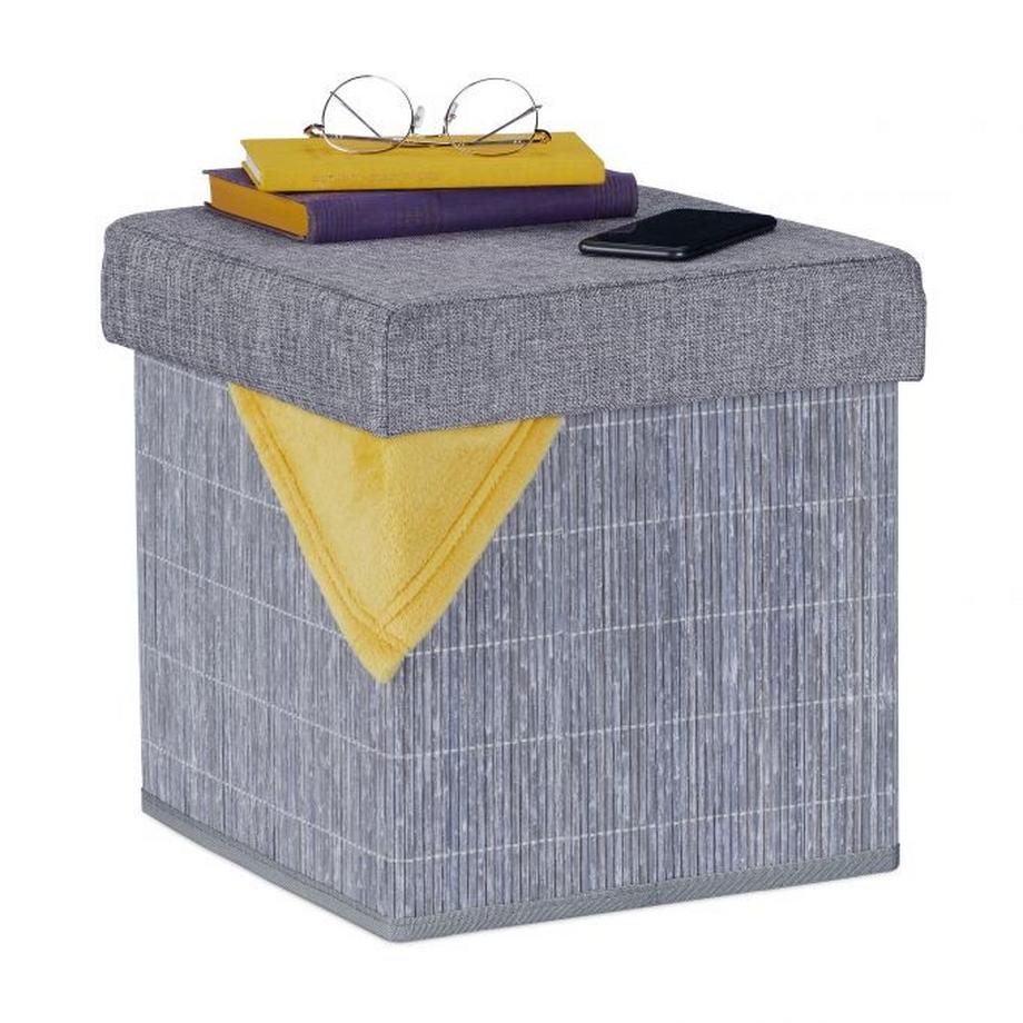 Grauer Hocker mit Stauraum