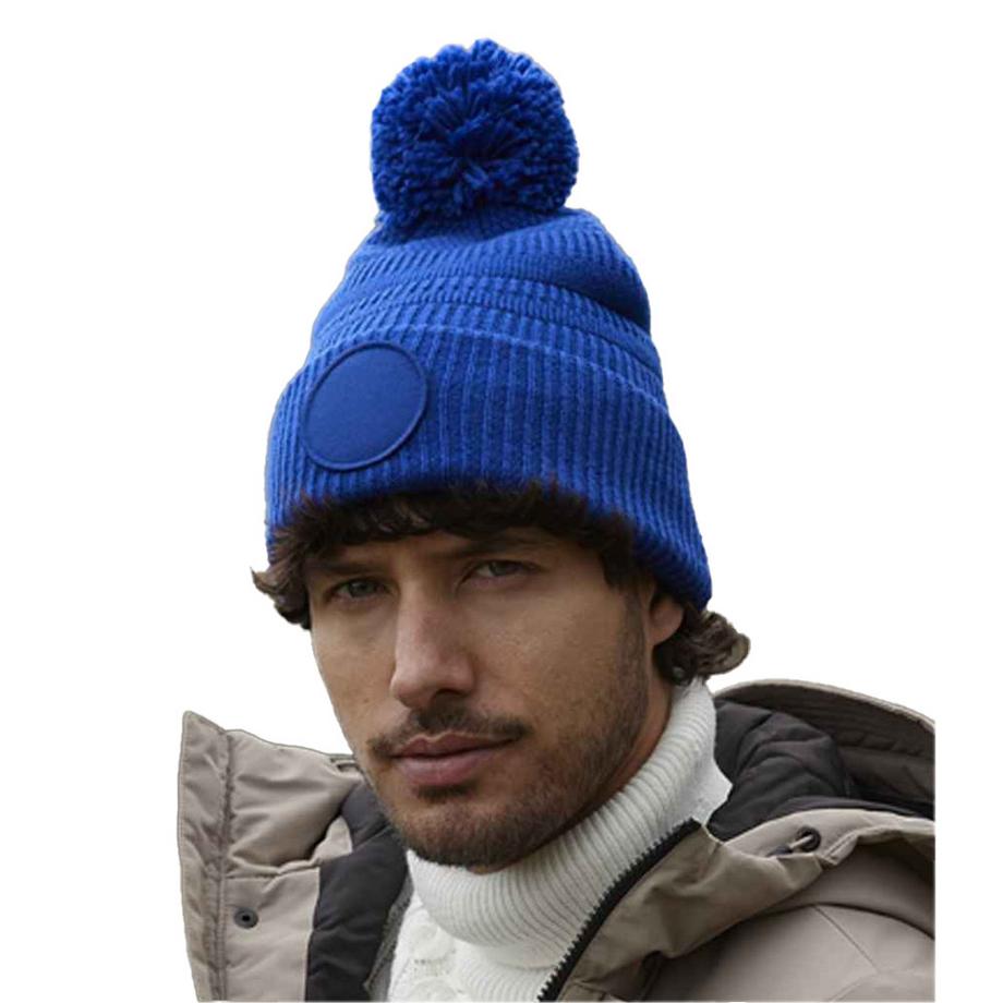 Beechfield Berretto con Pom Pom e Tasca a Toppa  