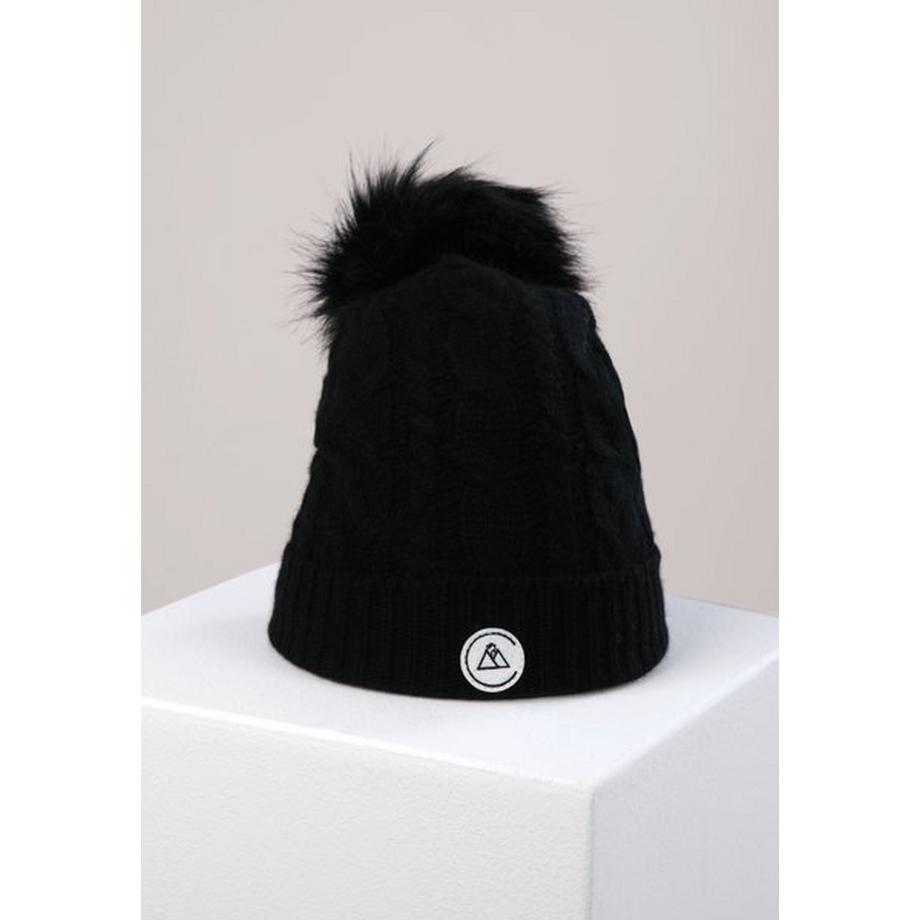 Bonnet torsadé avec pompon