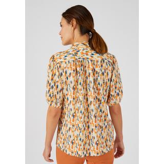 Damart  Geblümte Jacquard-Bluse mit Reliefstruktur, V-Ausschnitt mit Volants, Schulterpasse angerüscht. 