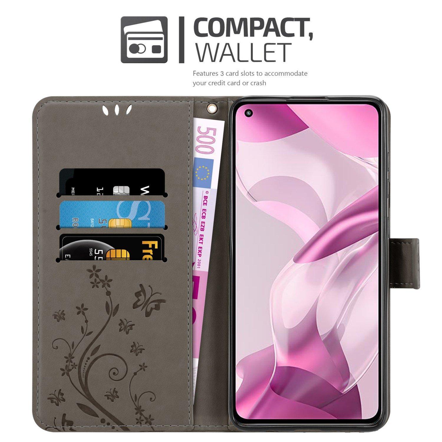 Cadorabo  Housse compatible avec Xiaomi Mi 11 LITE (4G / 5G) / 11 LITE NE - Coque de protection au design floral avec fermeture magnétique, fonction de support et emplacements pour cartes 