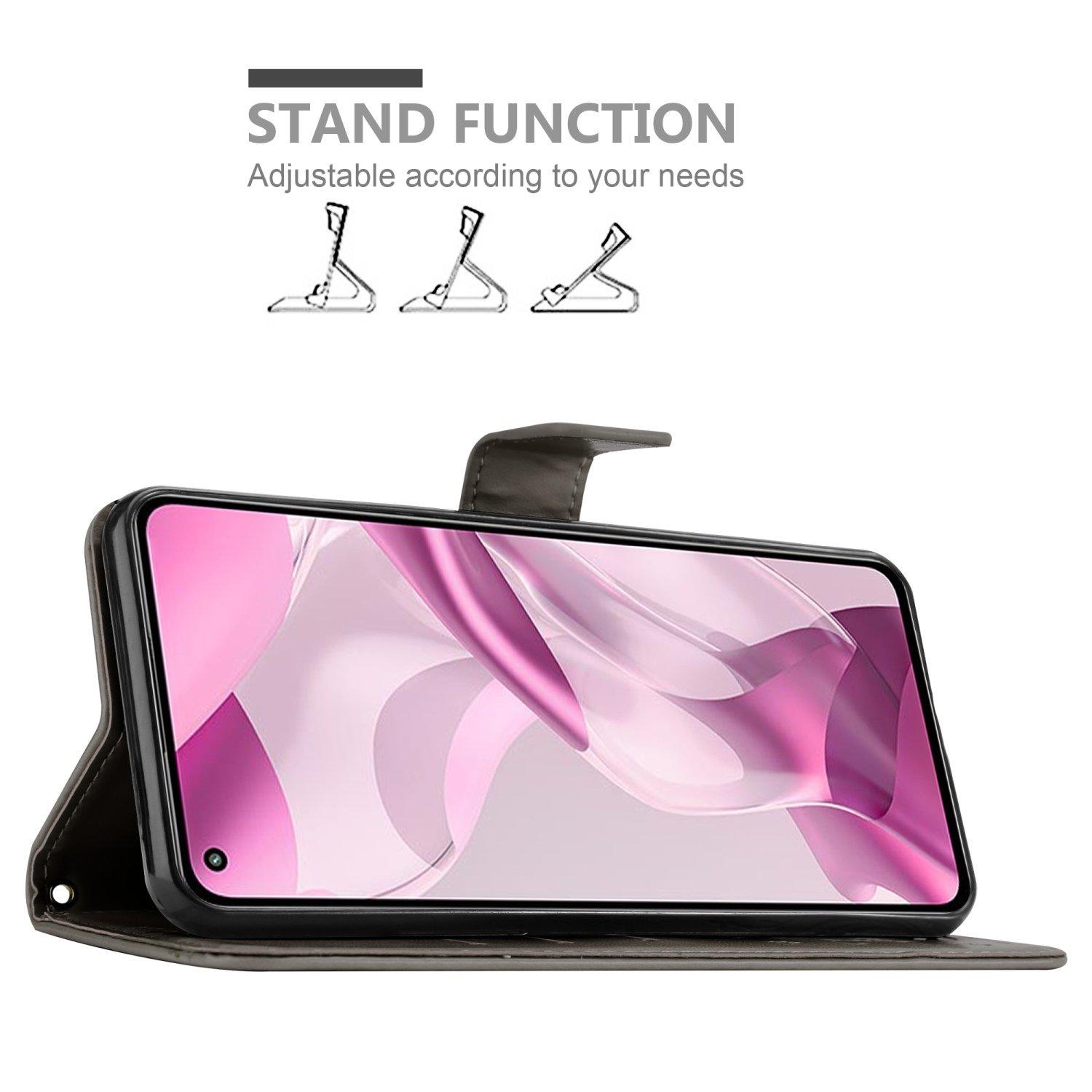 Cadorabo  Housse compatible avec Xiaomi Mi 11 LITE (4G / 5G) / 11 LITE NE - Coque de protection au design floral avec fermeture magnétique, fonction de support et emplacements pour cartes 