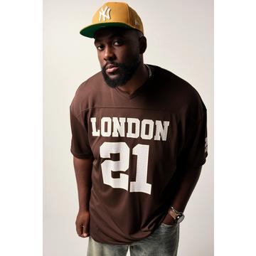 T-shirt en mesh STHUGE, coupe oversize à manches courtes, imprimé football américain - jusqu'au 8 XL