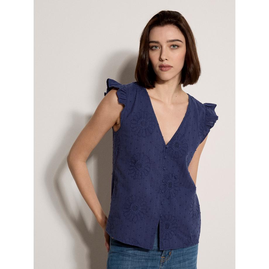 Blouse brodée de marguerites