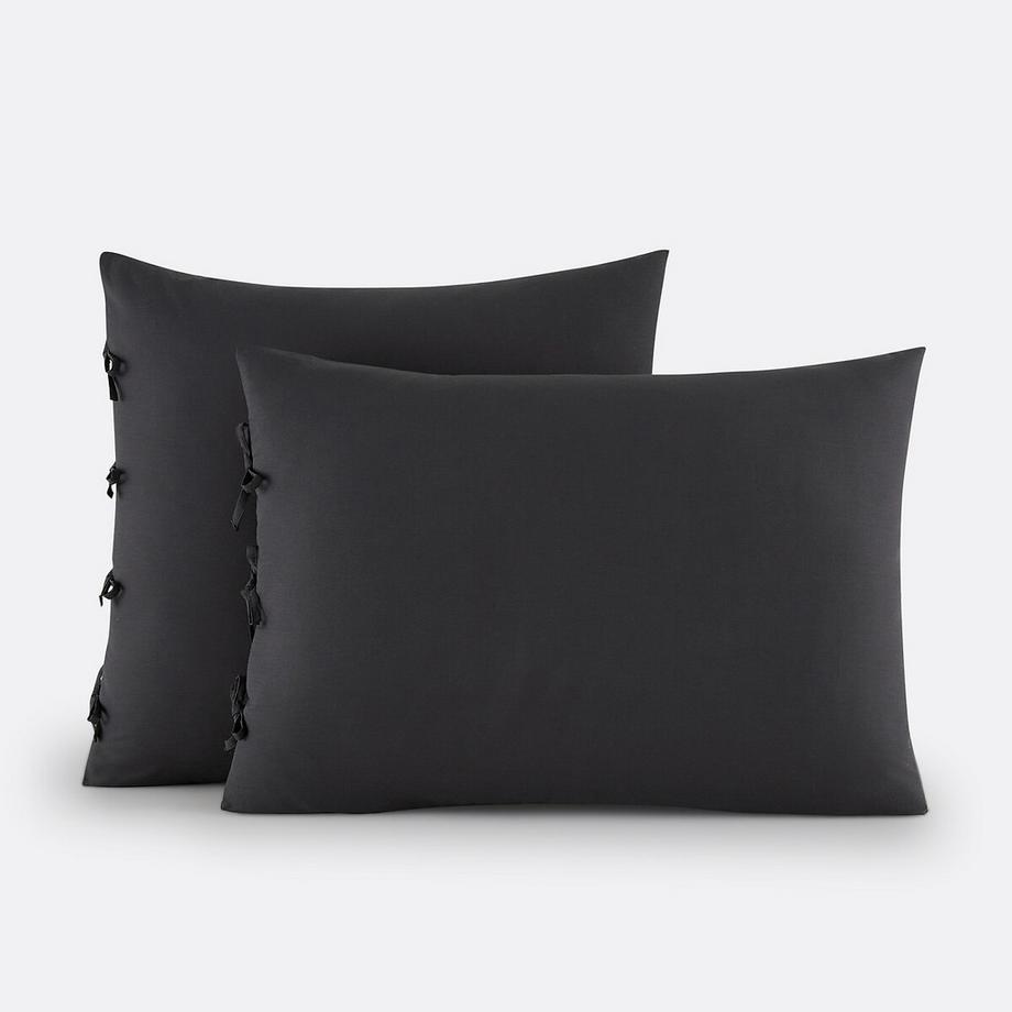 Taie d'oreiller unie à nouettes en coton