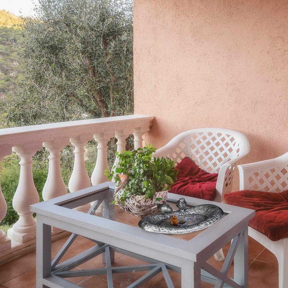 B2X  Vogelbad aus Gusseisen mit Vögeln 