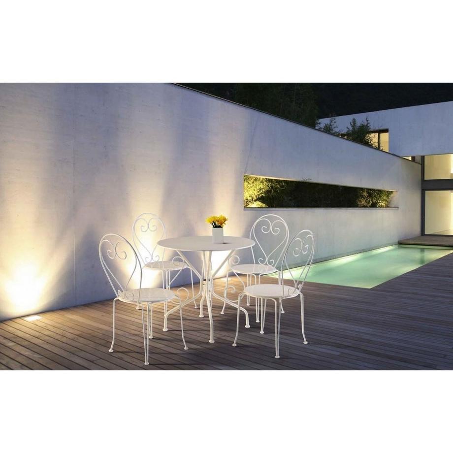 Vente-unique Salle à  manger de jardin en métal façon fer forgé  une table 4 chaises empilables GUERMANTES  