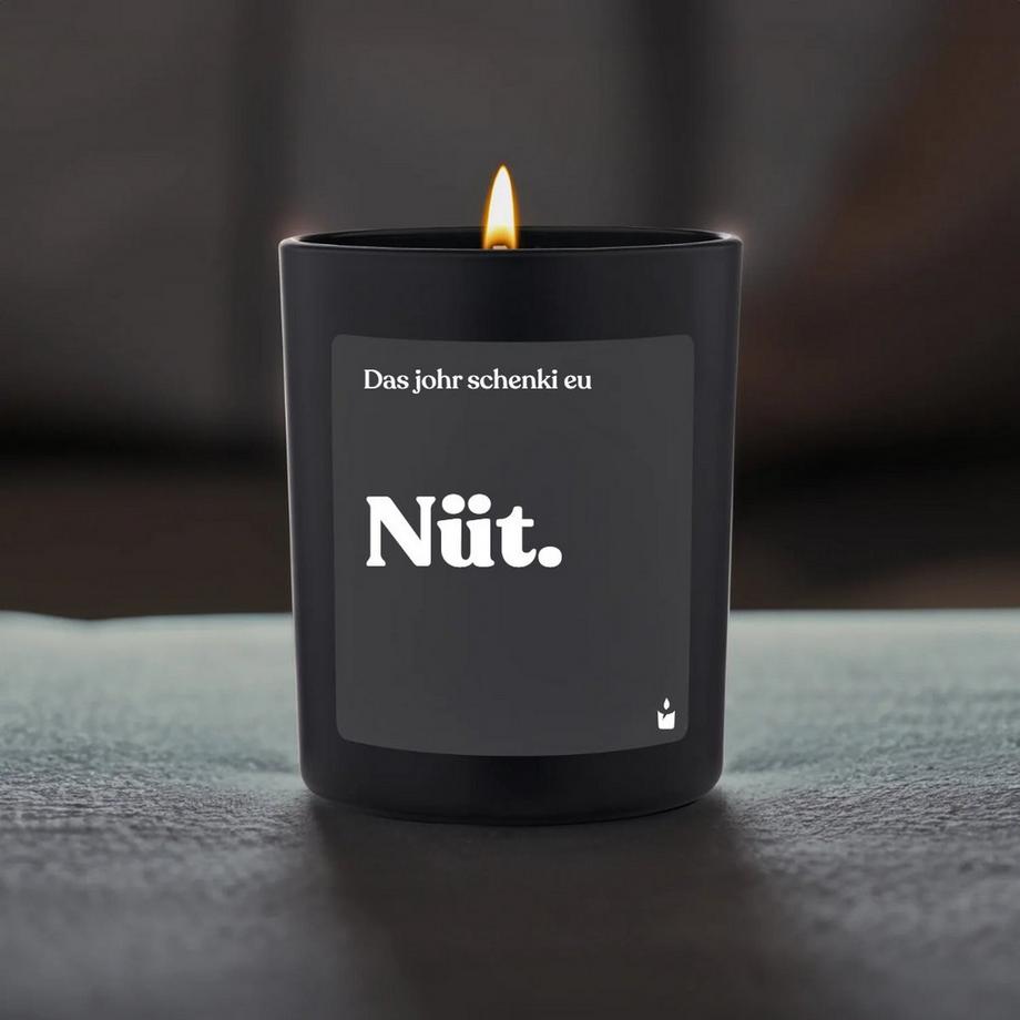 CandleHand Duftkerze Woody Das johr schenki eu Nüt.  
